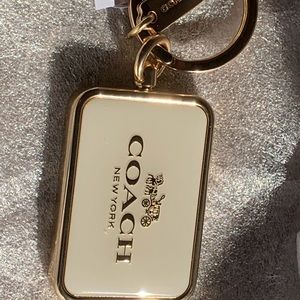 Coach & Horse NWT COACH Horse And Carriage Bag Charm/keychain. Chalk & Gold
